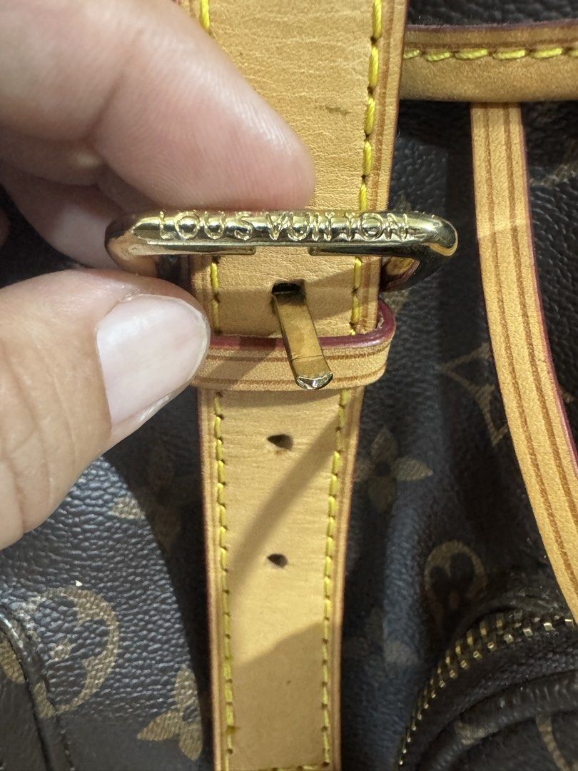 Louis Vuitton Monogram Canvas Backpack (Category: Luxury Bags & Wallets) located in Manila. Submitted by wildbear.e10374 (Listing ID 1458810288, Image 3). Description: - Authentic Louis Vuitton backpack - Classic Monogram canvas - Drawstring closure - Multiple zippered pockets - Leather trim and straps - Gold-tone hardware with LV engravings - Ideal for everyday use or travel.
