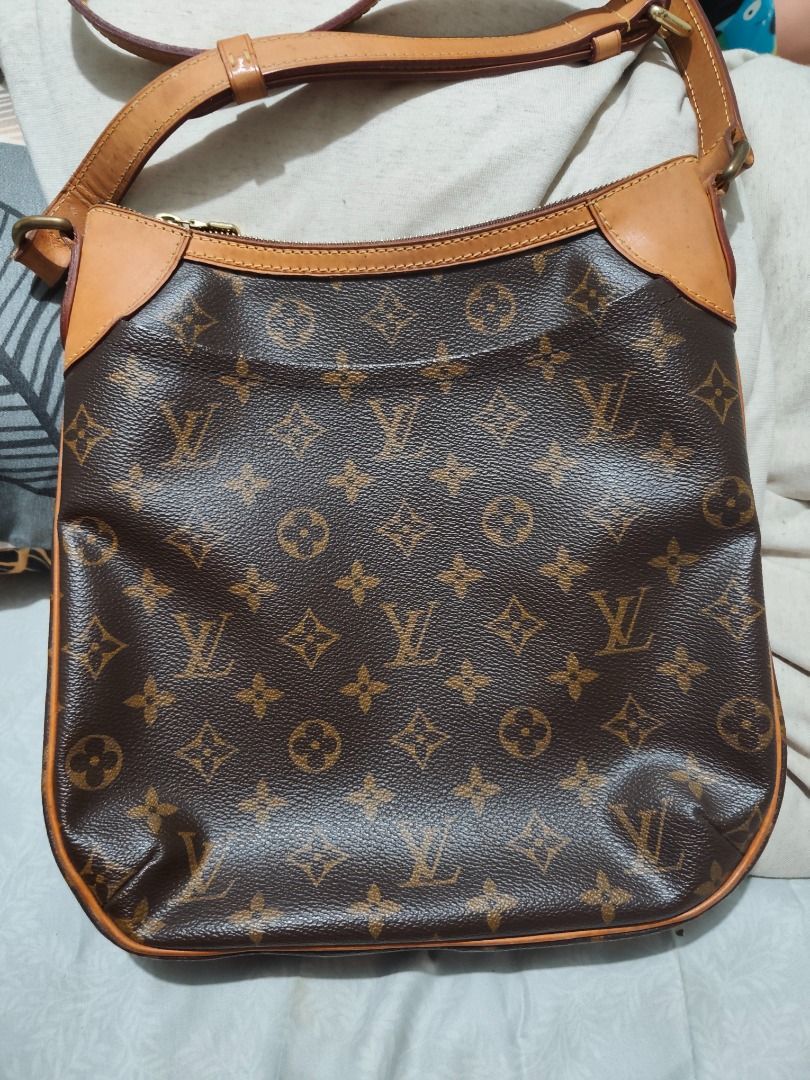 Louis Vuitton Monogram odeon Shoulder Bag (Category: Luxury Bags & Wallets) located in Caloocan City. Submitted by refreshmycloset444 (Listing ID 1458876435, Image 1). Description: - Classic Louis Vuitton monogram odeon shoulder bag - Genuine leather trim and strap - Interior zippered pocket for secure storage - Shows some signs of wear on leather trim and corners, consistent with age - Overall in very good, pre-loved condition - Ideal as a styli