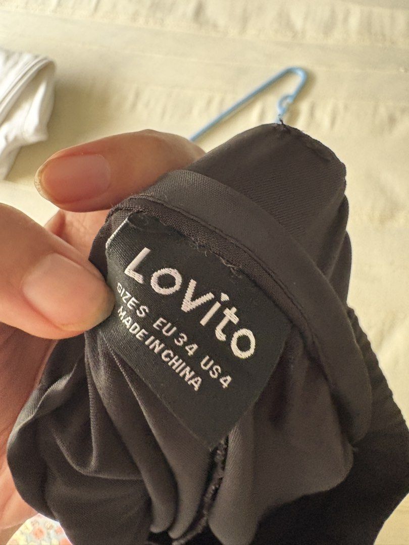 Lovito Black Tailored Trousers EU34 US4 (Category: Other Bottoms) located in Paranaque City. Submitted by craftywoobieph (Listing ID 1458749130, Image 3). Description: - Brand: Lovito - Color: Black - Style: Tailored Trousers - Fit: Straight leg - Waistband: Elasticated at the back for comfort - Closure: Button and zip front - Features: Side pockets - Versatility: Ideal for work or casual outfits, pairs easily with any top..