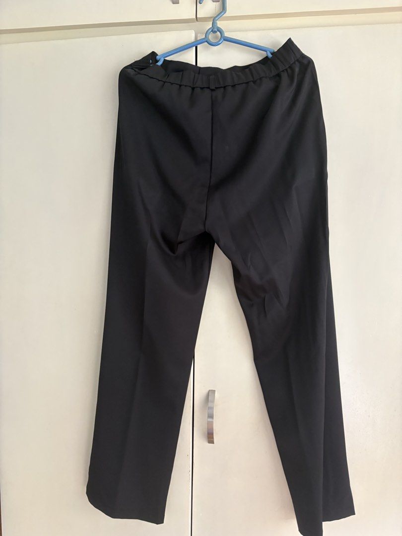 Lovito Black Tailored Trousers EU34 US4 (Category: Other Bottoms) located in Paranaque City. Submitted by craftywoobieph (Listing ID 1458749130, Image 2). Description: - Brand: Lovito - Color: Black - Style: Tailored Trousers - Fit: Straight leg - Waistband: Elasticated at the back for comfort - Closure: Button and zip front - Features: Side pockets - Versatility: Ideal for work or casual outfits, pairs easily with any top..