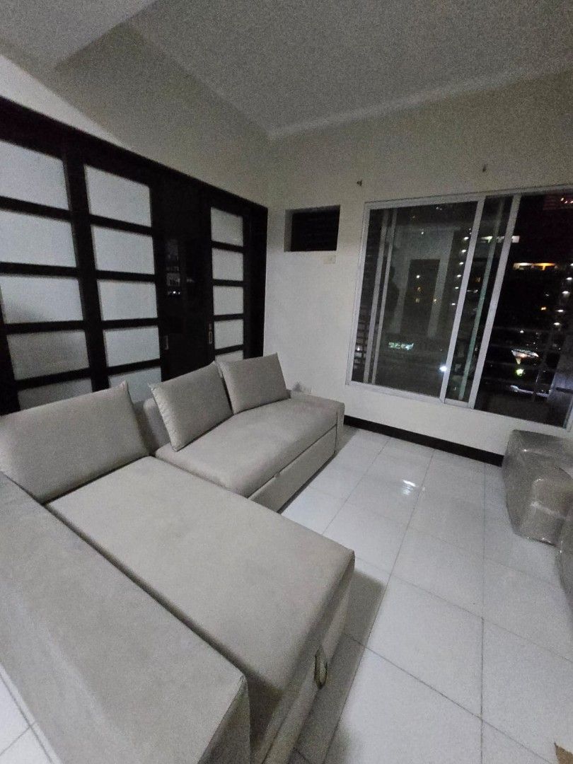 L-shaped sofa (Category: Sofas) located in Manila. Submitted by knasun15 (Listing ID 1458785825, Image 1). Description: - Modular L-shaped sofa / sofa bed - Gray, neutral color, versatile for any home decor - Converts to sofa bed -Ideal for living rooms and entertainment spaces RFS: moving out - Pick up at Pasig City (near Estancia, Ayala malls 30th).