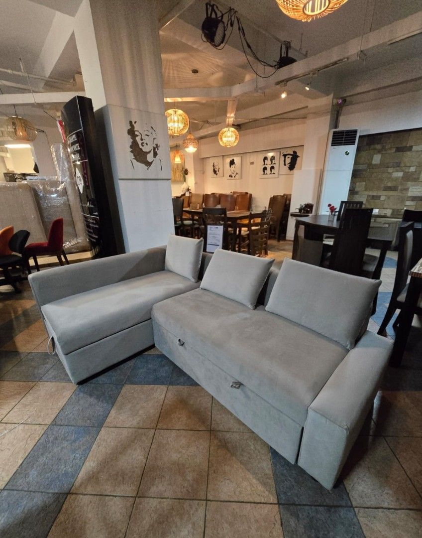 L-shaped sofa (Category: Sofas) located in Manila. Submitted by knasun15 (Listing ID 1458785825, Image 2). Description: - Modular L-shaped sofa / sofa bed - Gray, neutral color, versatile for any home decor - Converts to sofa bed -Ideal for living rooms and entertainment spaces RFS: moving out - Pick up at Pasig City (near Estancia, Ayala malls 30th).