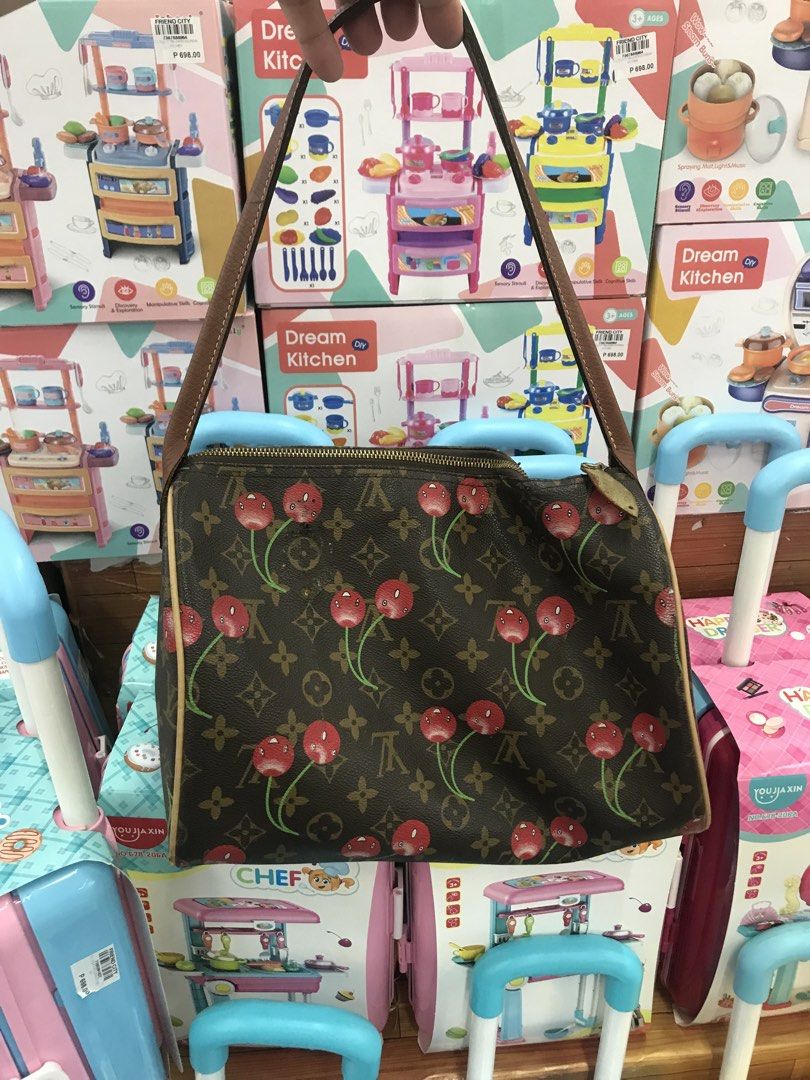 LV Cherry (Category: Purses & Pouches) located in Balete No 2. Submitted by troyesybang (Listing ID 1458794522, Image 1). Description: No code may damage sha sa dating placement ng handle No handle kase ito replaced by oG Longchamp strap May labas piping small deets on post ings X sensi Yun flaw nia gawa ng dating handle tinanggalan kasi sha Printed are clear hindi burado Size 30 Plus sf.