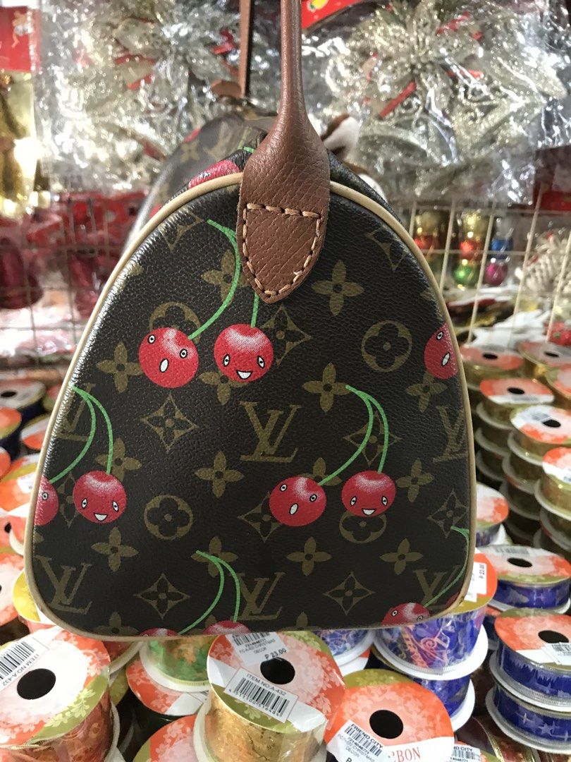 LV Cherry (Category: Purses & Pouches) located in Balete No 2. Submitted by troyesybang (Listing ID 1458794522, Image 3). Description: No code may damage sha sa dating placement ng handle No handle kase ito replaced by oG Longchamp strap May labas piping small deets on post ings X sensi Yun flaw nia gawa ng dating handle tinanggalan kasi sha Printed are clear hindi burado Size 30 Plus sf.