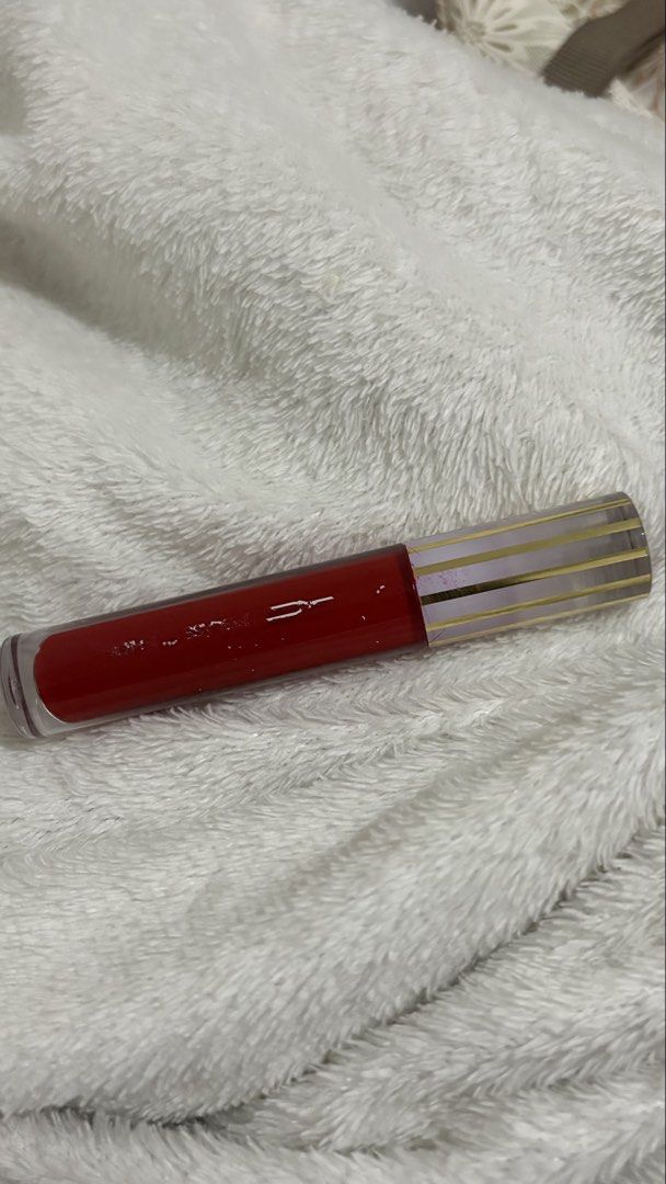 MAC Lipglass Cushion Red Lip Gloss (Category: Makeup) located in Quezon City. Submitted by ppauline4856273 (Listing ID 1458842096, Image 2). Description: - Vibrant red MAC Lipglass Cushion - Unique cushion applicator for soft, diffused application - Sleek packaging with gold striped cap - Adds a pop of color to any look - Easy to carry for touch-ups Last price, used twice. Gift lang. Recent lang nabili.