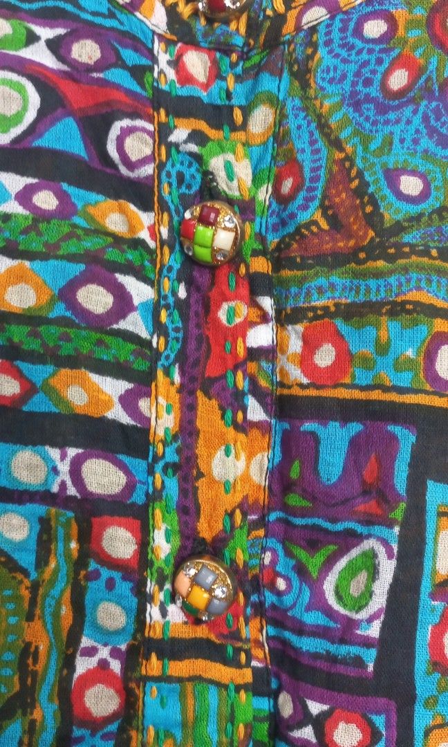 Macrame Bohemia Multicolored Geometric Patchwork Boho Dress (Size 4) (Category: Dresses) located in Naga. Submitted by whimsy_vault (Listing ID 1458751178, Image 3). Description: FLAT LAY MEASUREMENTS (Approximate): • Pit to Pit: 20 inches • Length: 47 inches Elevate your wardrobe with this stunning, vibrant piece from Macrame Bohemia. Proudly Made in India, this dress features an eye-catching, whimsical geometric patchwork design filled with ric