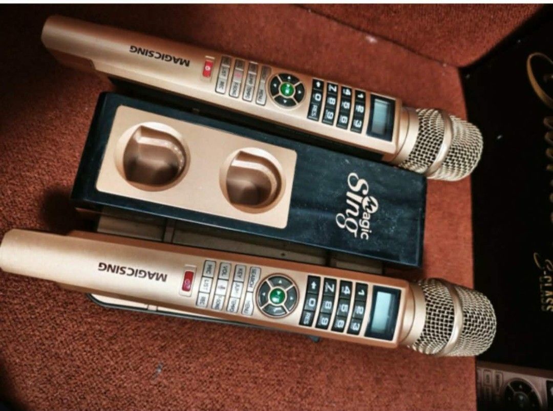 Magic Sing Diamond E-Class Wireless Karaoke Microphones with Dock (Category: Soundbars, Speakers & Amplifiers) located in Pasig City. Submitted by safebear_52fee3 (Listing ID 1458845303, Image 2). Description: - Magic Sing Diamond E-Class wireless karaoke microphones - Color: Gold and Black - Includes charging dock and remote - Tested and working - Original box included - Ideal for home karaoke sessions.