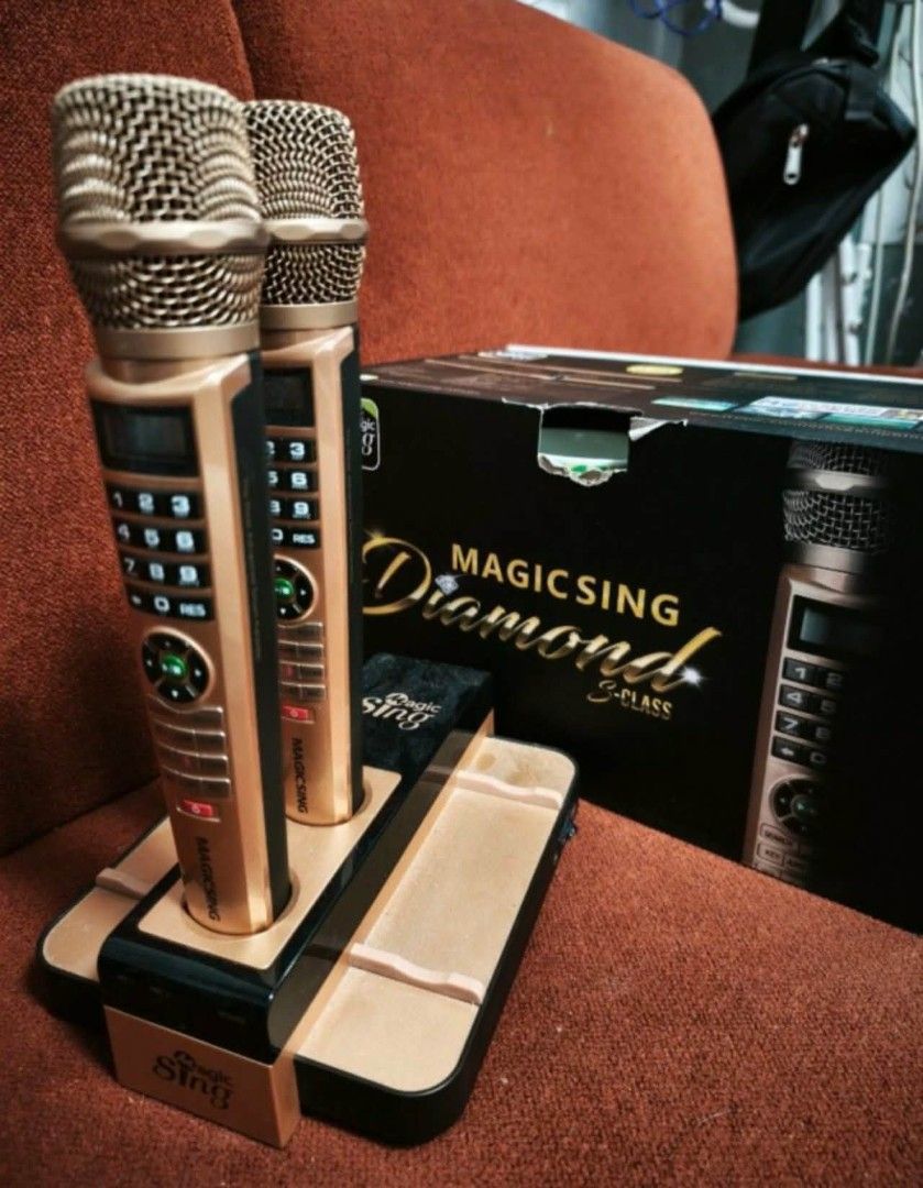 Magic Sing Diamond E-Class Wireless Karaoke Microphones with Dock (Category: Soundbars, Speakers & Amplifiers) located in Pasig City. Submitted by safebear_52fee3 (Listing ID 1458845303, Image 3). Description: - Magic Sing Diamond E-Class wireless karaoke microphones - Color: Gold and Black - Includes charging dock and remote - Tested and working - Original box included - Ideal for home karaoke sessions.