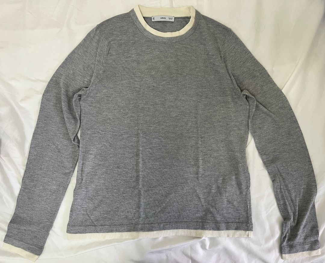 MANGO Fine-knit sweater with contrasting trims (Category: Longsleeves) located in Quezon City. Submitted by max.declutter (Listing ID 1458760055, Image 1). Description: Fine knit fabric. Straight design. Crew neck. Long sleeves. Contrasting trim finish. Composition: 40% viscose, 35% polyester, 20% polyamide, 5% cashmere Reference when worn: https://shop.mango.com/jp/en/p/women/sweaters-and-cardigans/plus-sizes/fine-knit-sweater-with-contrasting-t
