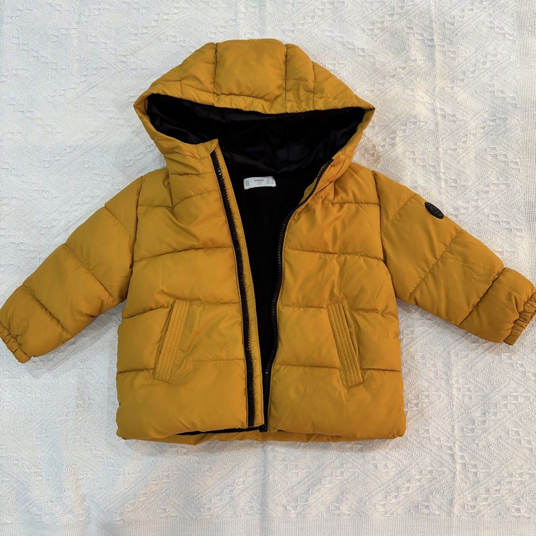 Mango Kids Yellow Puffer Jacket 12-18 Months (Category: Babies & Kids Fashion) located in Cavite. Submitted by decluttererminer (Listing ID 1458698870, Image 1). Description: - Yellow puffer jacket from Mango Kids - Lined with black fleece for extra warmth - Hooded design - Zipper closure with pockets - Size: 12-18 months / 86cm - Ideal for cold weather - first owner : my daughter (can be used by boys also) - rfs: outgrown - authentic - washed - 