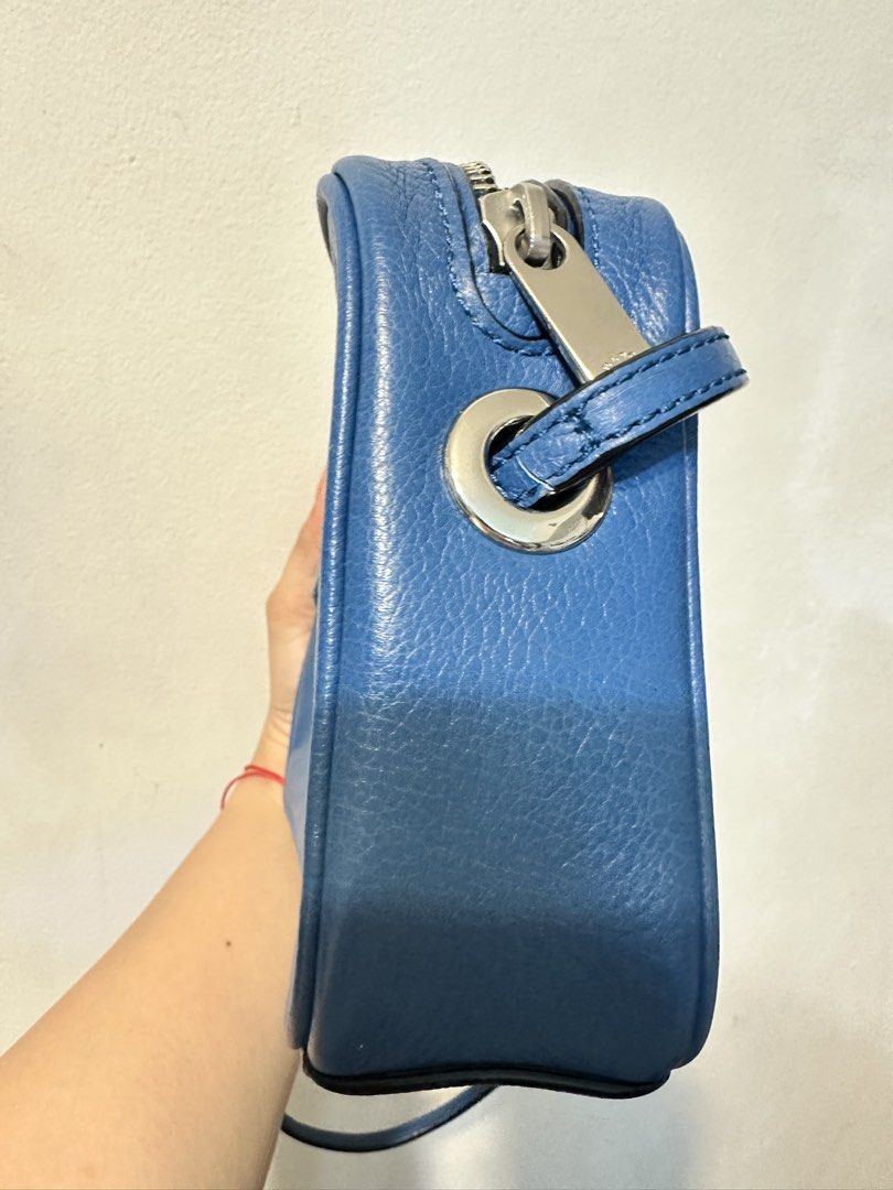 Marc Jacobs Blue Leather Cross Body Bag (Category: Luxury Bags & Wallets) located in Quezon City. Submitted by whengaloolu (Listing ID 1458726309, Image 3). Description: - Authentic Marc Jacobs blue leather crossbody bag - Front zip pocket for quick access - Spacious main zip compartment - Elegant silver hardware details - Adjustable strap.