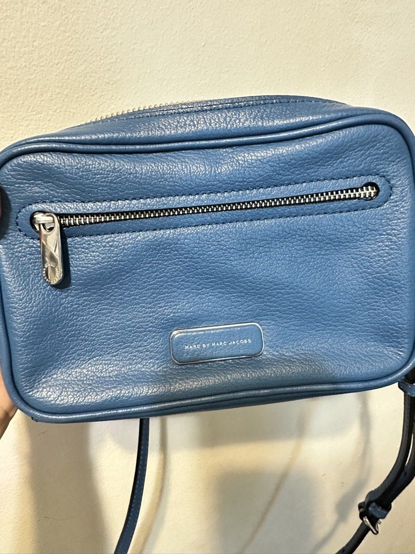 Marc Jacobs Blue Leather Cross Body Bag (Category: Luxury Bags & Wallets) located in Quezon City. Submitted by whengaloolu (Listing ID 1458726309, Image 1). Description: - Authentic Marc Jacobs blue leather crossbody bag - Front zip pocket for quick access - Spacious main zip compartment - Elegant silver hardware details - Adjustable strap.