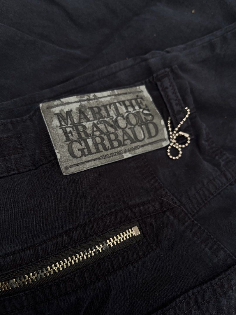 MARITHE + FRANCOIS GIRBAUD Stone Washed Navy Blue Wide Leg Pants (Category: Jeans) located in Bacoor. Submitted by 4103archivalgarmentph (Listing ID 1458778703, Image 3). Description: - Vintage Marithe + Francois Girbaud pants - Stone-washed navy blue color - Wide leg fit - Multiple pockets with zipper details - Button and zip fly - Ideal for streetwear or Y2K aesthetic - Features unique label and hardware -no issue -as new -30-32w -40L -9hem.