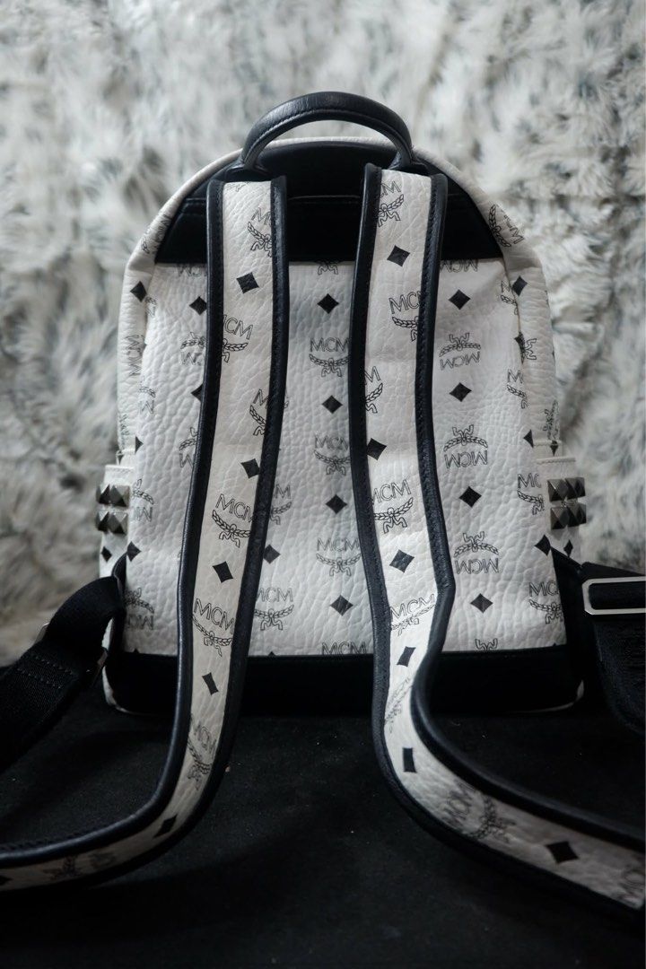 MCM Classic White Visetos Stud Backpack (Category: Backpacks) located in Rizal. Submitted by kitelberdin (Listing ID 1458717257, Image 2). Description: • Visetos Small Side Stud Stark Backpack – White • Condition: Pre-loved / good overall exterior condition • Classic Visetos monogram with side stud detailing • Authentic • Bought from Myeongdong Seoul, Korea • Spacious and suitable for everyday use Note: Interior lining has some peeling/wear due t