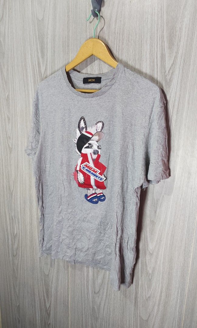 MCM V- Moments Rabbit Patch Shirt (Category: Tshirts & Polo Shirts ) located in Naga. Submitted by secondspinv2 (Listing ID 1458887070, Image 2). Description: MCM V- Moments Rabbit Patch Shirt ✅Size: L ✅Width: 22 ✅Length: 27 ✅Color Rate: 9.5/10 ✅No Issue ✅Need Wash ✅Location: Bicol Naga City, Camarines Sur ✅Courier: J&T Express/Flash Express ✅MOP: Gcash only.