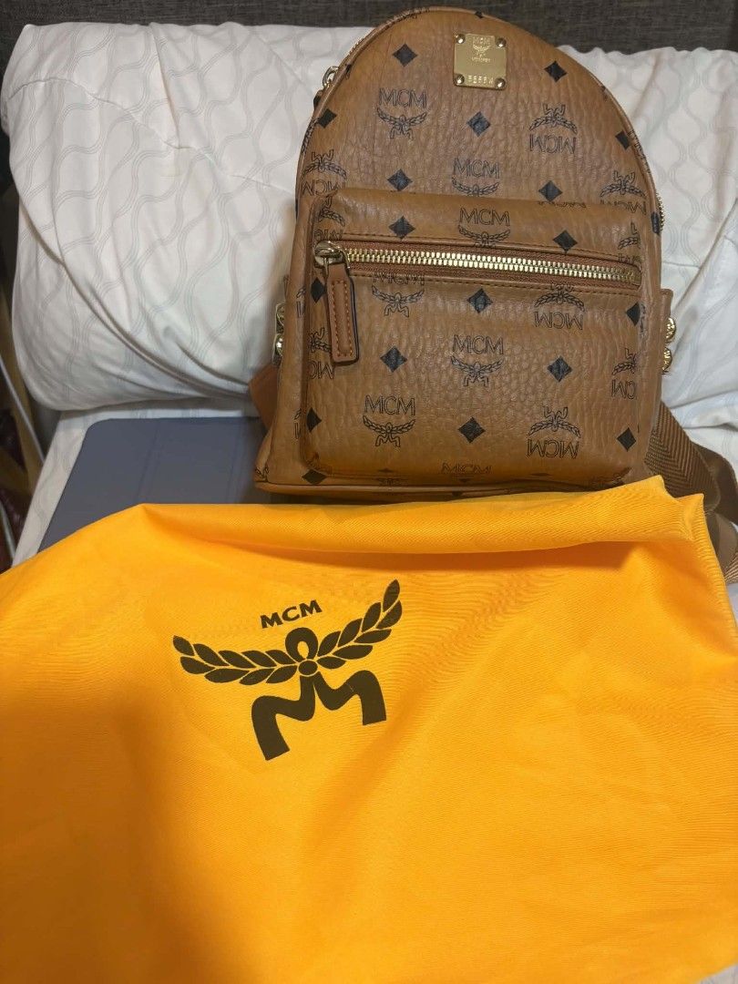 MCM Visetos Stark Backpack Mini Cognac (Category: Luxury Bags & Wallets) located in Quezon City. Submitted by mc397m (Listing ID 1458877896, Image 3). Description: LOCATION: VISAYAS AVENUE QC - Classic MCM MINI backpack - Leather interior - Iconic Visetos print - Color: Cognac - Hardware: Gold - Comes with dust bag Pls message for bundle.