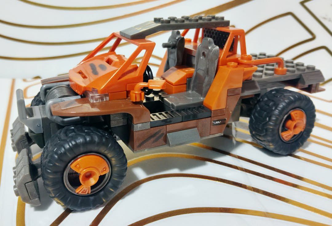 Mega Construx Halo Warthog Building Set (Category: Lego & Building Sets) located in Quezon City. Submitted by daveaeu08 (Listing ID 1458780448, Image 1). Description: - Mega Construx Halo Warthog - Classic Warthog vehicle design - Orange and brown color scheme - Seats for figures - Features large, rugged tires - Ideal for Halo fans and collectors - Great for imaginative play and display.