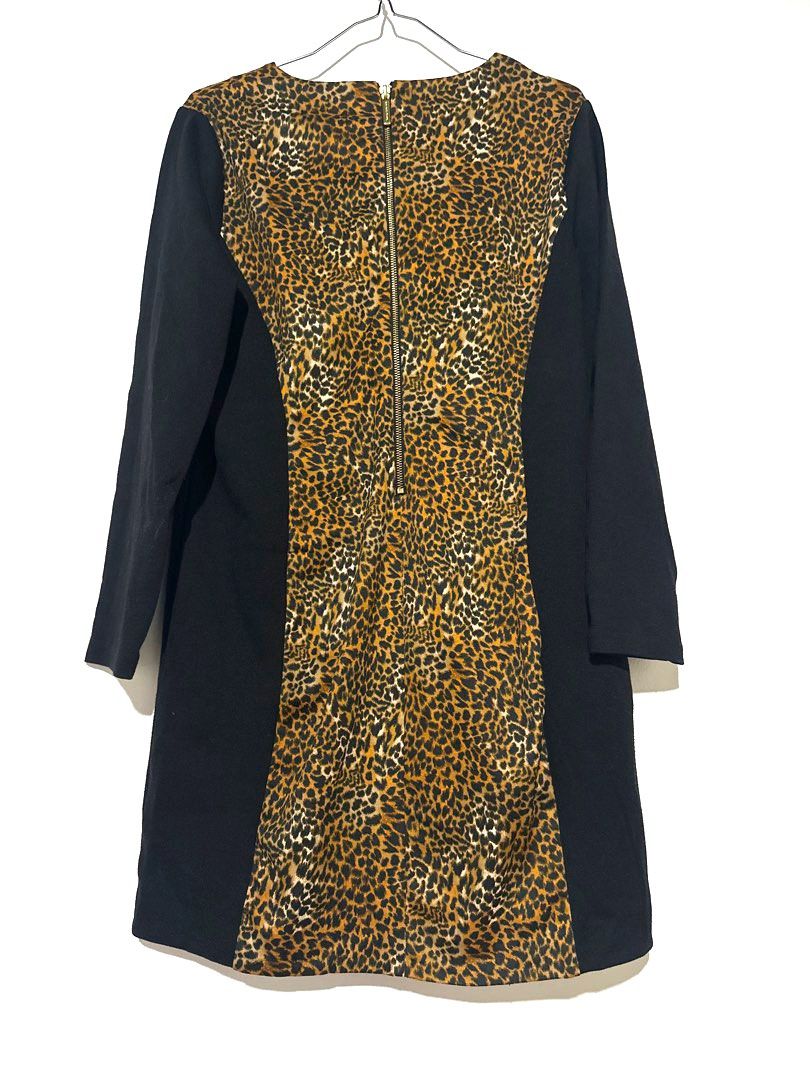 Michael Michael Kors Leopard Print Panel Black Dress Size 16 (Category: Dresses) located in Manila. Submitted by classictrends_24 (Listing ID 1458647478, Image 2). Description: - Stylish black dress - Eye-catching leopard print panel down the front - Long sleeves for added coverage - Convenient back zipper closure - Versatile for both work and night out occasions - Proudly made in Indonesia.