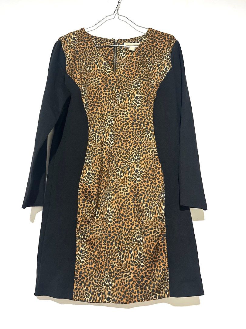 Michael Michael Kors Leopard Print Panel Black Dress Size 16 (Category: Dresses) located in Manila. Submitted by classictrends_24 (Listing ID 1458647478, Image 1). Description: - Stylish black dress - Eye-catching leopard print panel down the front - Long sleeves for added coverage - Convenient back zipper closure - Versatile for both work and night out occasions - Proudly made in Indonesia.