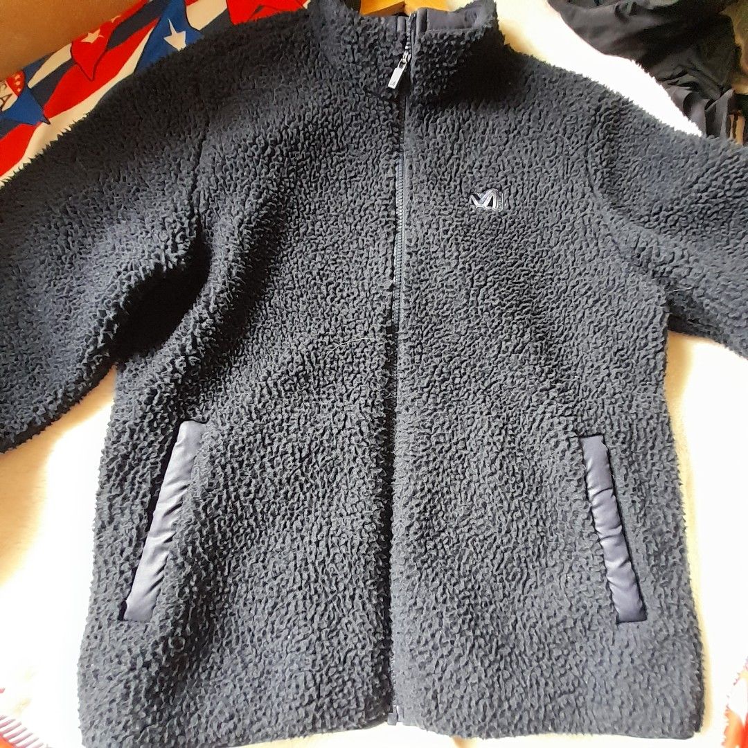 Millet Fleece Jacket (Category: Coats, Jackets and Outerwear) located in Bocaue. Submitted by marajapansurplus (Listing ID 1458725014, Image 1). Description: - Millet black fleece jacket - Full zip closure - Two zippered front pockets - Soft and warm material - Ideal for layering, casual wear, or outdoor activities.