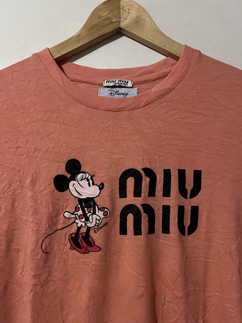 MIU MIU x DISNEY SHIRTS (Category: Others Tops) located in Manila. Submitted by dailystrategythrift (Listing ID 1458729972, Image 2). Description: MIU MIU x DISNEY SHIRTS CUT WASHTAG! WIDTH - 19 LENGTH - 26 EXCELLENT CONDITION.