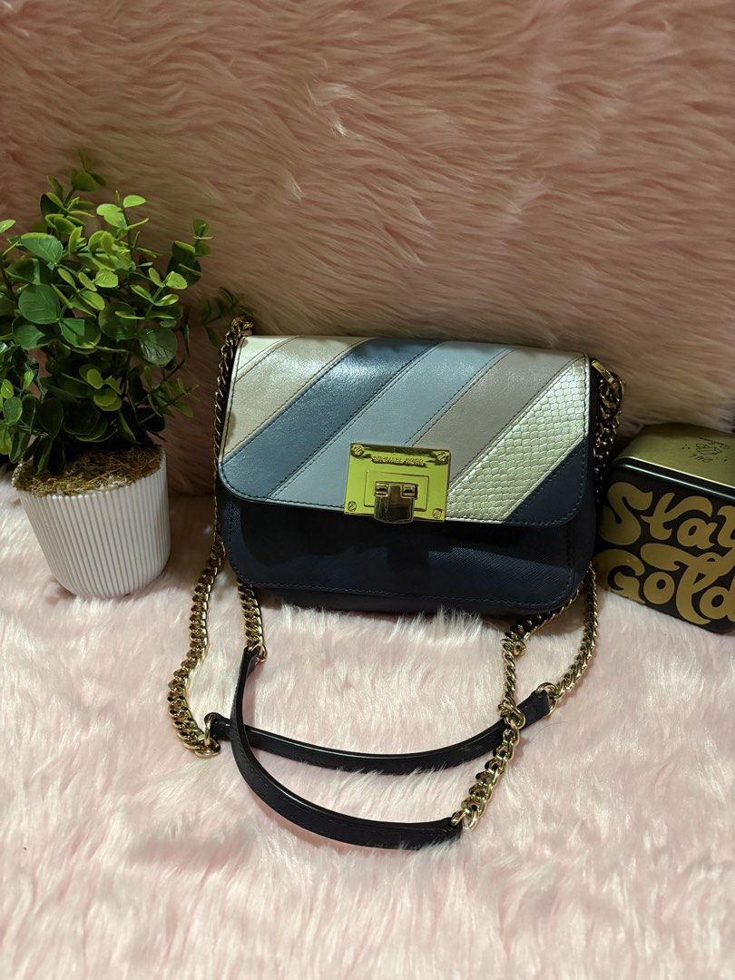 MK bag in chain (Category: Clutches) located in Tuguegarao City. Submitted by closet_jz (Listing ID 1458764286, Image 2). Description: .