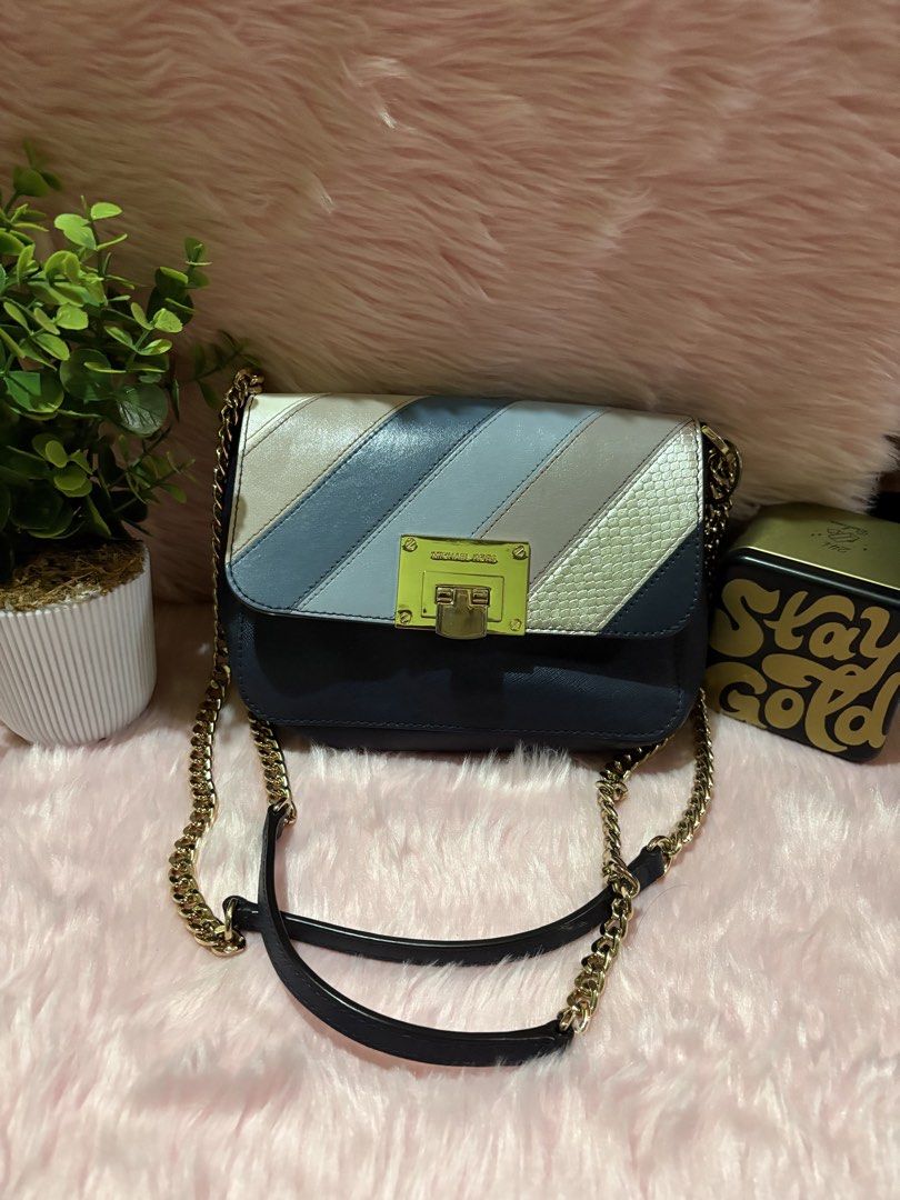 MK bag in chain (Category: Clutches) located in Tuguegarao City. Submitted by closet_jz (Listing ID 1458764286, Image 1). Description: .