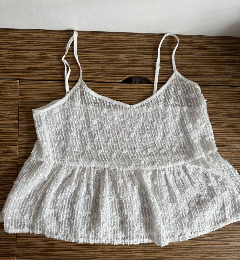 NET Ladies White Textured Camisole Top (Category: Sleeveless) located in Rizal. Submitted by prelovedbykash (Listing ID 1458749719, Image 1). Description: - never used - sheer - for layering/swimsuit cover up.