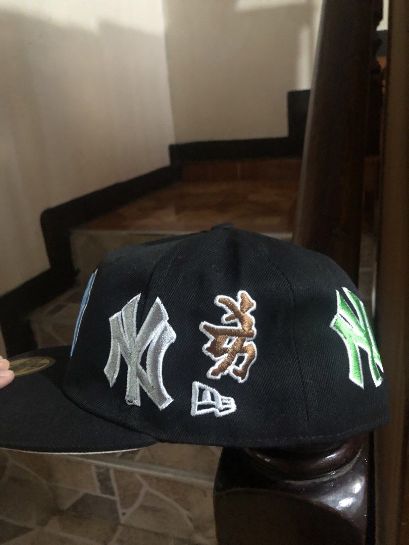 New Era 59FIFTY Multiple NY Patch / Supreme (Category: Caps & Hats) located in Manila. Submitted by rhanjicokes (Listing ID 1458879376, Image 2). Description: - Brand: New Era - Model: 59FIFTY Fitted Cap - Color: Black - Size: 7 1/2 - Features: Multiple embroidered New York Yankees logos (various colors/styles) - Additional Detail: Supreme logo patch - Ideal for: New York Yankees fans, streetwear enthusiasts.