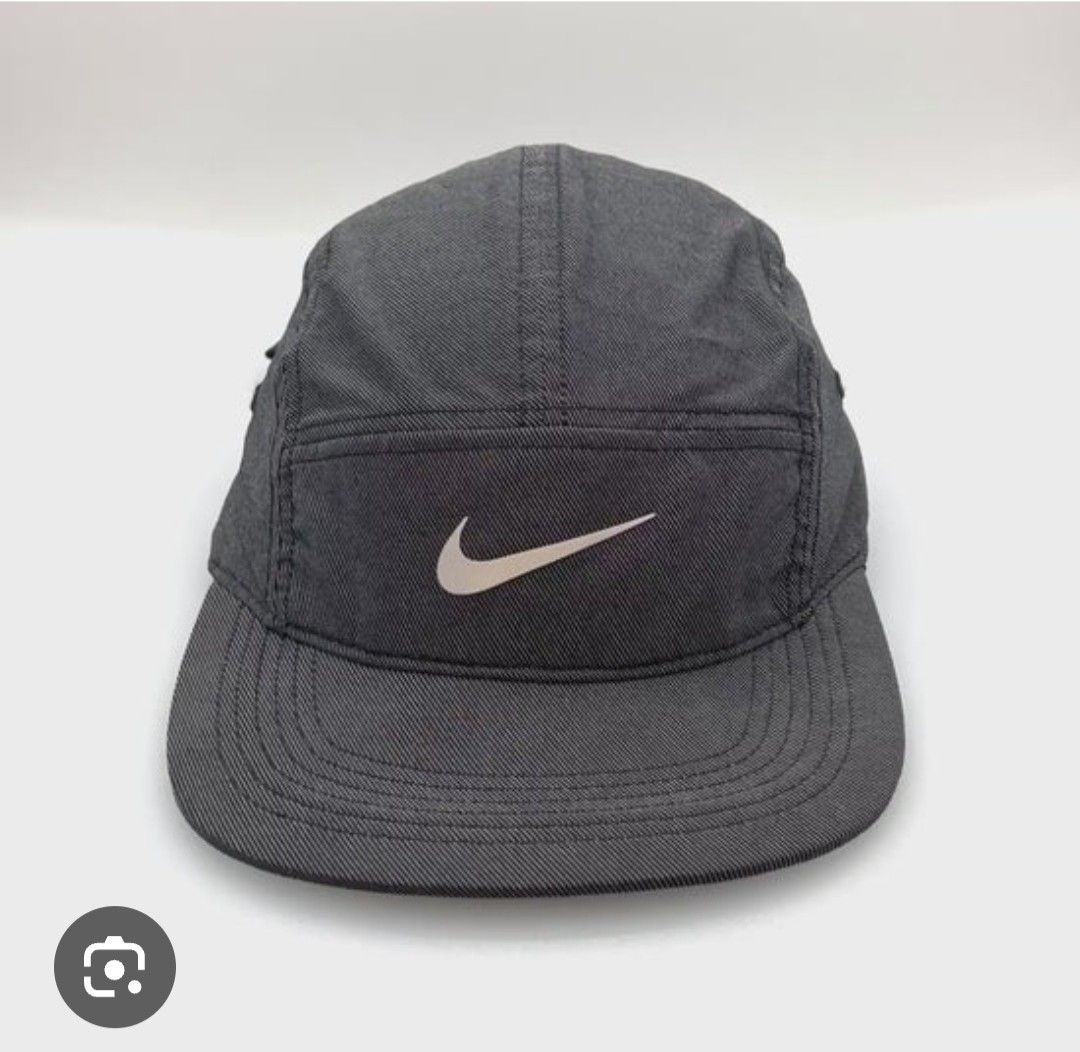 Nike AW84 Dri-Fit 5-Panel Cap Grey (Category: Activewear) located in Baler. Submitted by jaydeebaltazar (Listing ID 1458774993, Image 1). Description: - Grey Nike cap - Features iconic swoosh logo - Made with Dri-Fit material - Adjustable strap at the back - Perfect for sports or casual wear - Shows some signs of wear on the inner band.