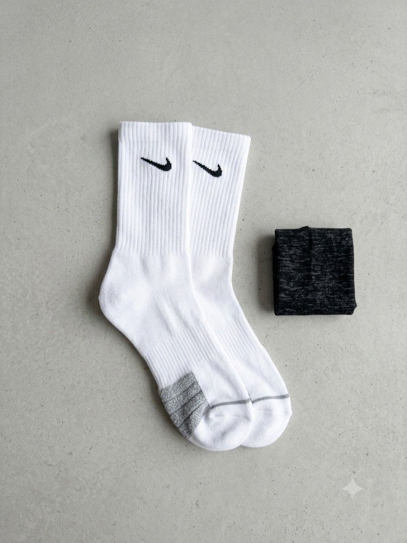 Nike Crew Socks White (3 Pairs) (Category: Socks) located in Manila. Submitted by prime.dlor (Listing ID 1458790473, Image 3). Description: - Pack of 3 pairs of white Nike crew socks - Classic design with iconic Nike swoosh - Ribbed cuffs for a snug and secure fit - Reinforced heel and toe for enhanced durability - Ideal for everyday wear, training, or sports activities.