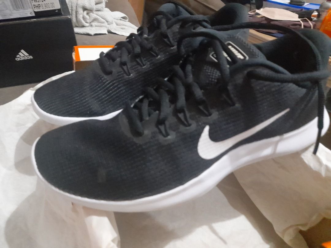 Nike Flex RN 2018 Black White Running Shoes (Category: Sneakers) located in Cainta. Submitted by patrickwilsonstore (Listing ID 1458835389, Image 3). Description: - Black Nike Flex RN 2018 running shoes - White sole and Nike swoosh - Breathable mesh upper - Lace-up closure - Ideal for workouts and everyday wear - Ready for your next run.