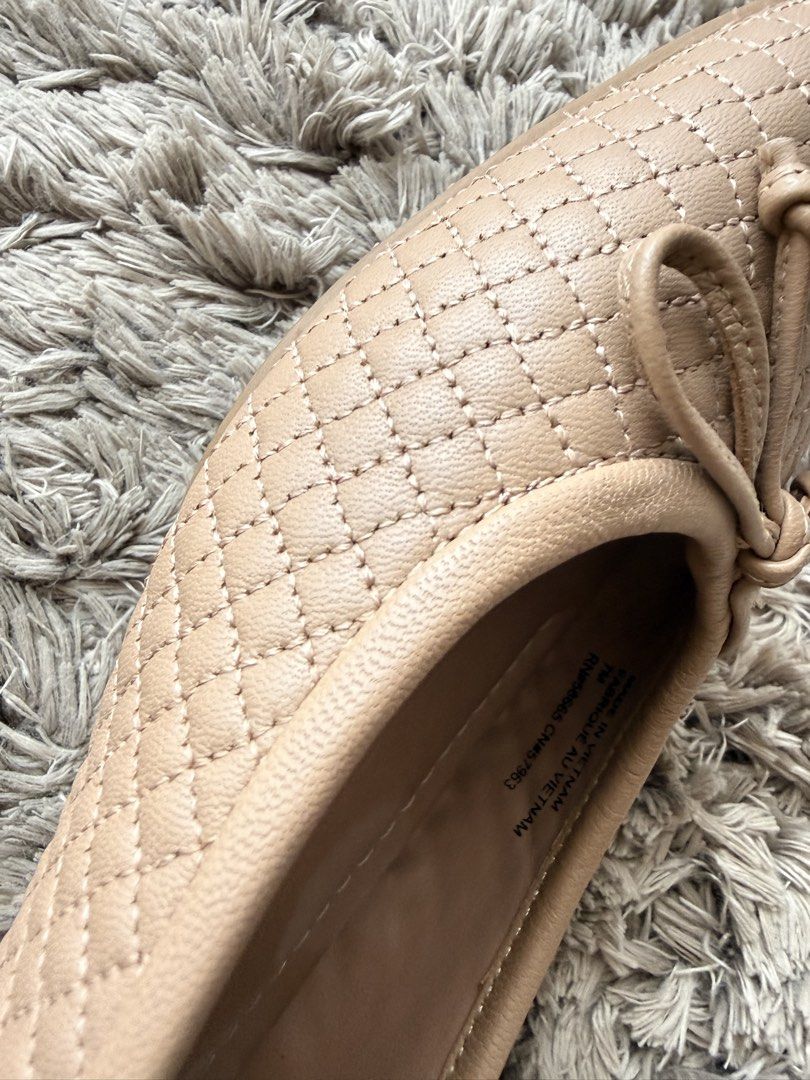 NORDSTROM Quilted Ballet Flats Beige (Category: Flats & Sandals) located in Taguig. Submitted by prelovedbyjajav (Listing ID 1458722024, Image 3). Description: - Beige quilted ballet flats from Nordstrom - Stylish square toe design - Adorable bow detail on the front - Convenient slip-on style - Made in Vietnam - Ideal for everyday wear - RFS: not my size.