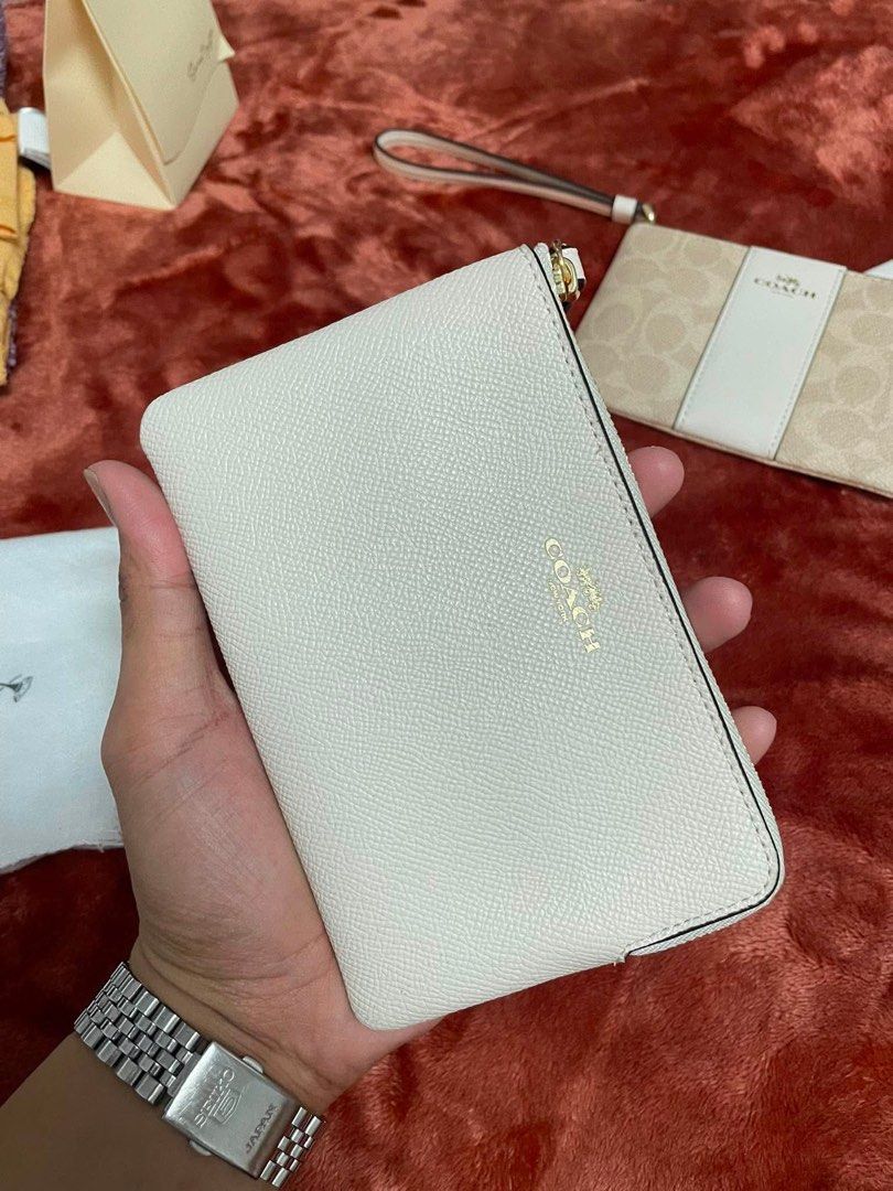 Original Coach Wristlet (Category: Wallets & Card holders) located in Rizal. Submitted by conielau (Listing ID 1458699593, Image 1). Description: 💯 original Brand new Loc: Lower Antipolo.