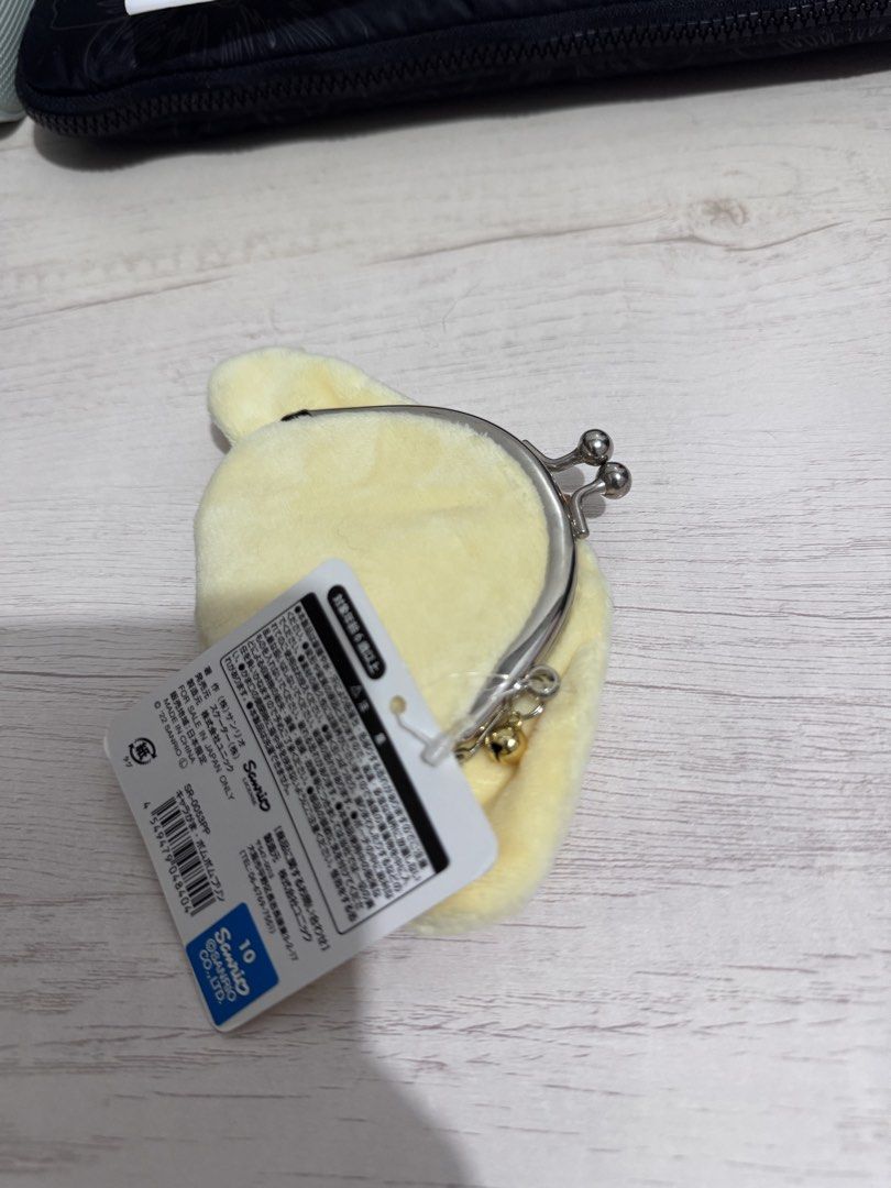 Original Sanrio Pompompurin Coin Purse (Category: Wallets & Card holders) located in Mandaluyong City. Submitted by minasitems (Listing ID 1458838060, Image 3). Description: Good as new! Super cute. Bought from Japan 📌 MOP: GCash 📌 MOD: Lalamove/Grab, J&T, GGX, LBC 📌 Location: Mandaluyong/Ortigas.