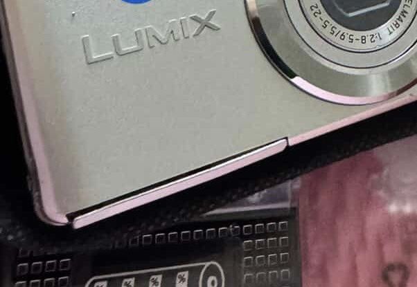 Panasonic Lumix Digital Camera Leica Lens (Category: Cameras) located in Caloocan City. Submitted by xdgalejand84900 (Listing ID 1458789898, Image 2). Description: - Silver Panasonic Lumix digital camera - Equipped with a high-quality Leica DC VARIO-ELMARIT lens -Japanese language only - Compact and portable design, ideal for on-the-go photography - Perfect for everyday snapshots and quick captures - Includes Pink Beads pendant, Pink case, Altern