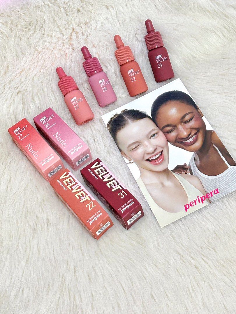 Peripera Ink Velvet Lip Tints - Various Shades (Category: Makeup) located in Batangas. Submitted by nommi26 (Listing ID 1458858709, Image 1). Description: - Peripera Ink Velvet Lip Tints - Available Shades: 22, 27, 28, 31, Nude - Finish: Soft, velvety - Versatile: Perfect for natural or bold looks - Formula: Long-lasting 380 each.