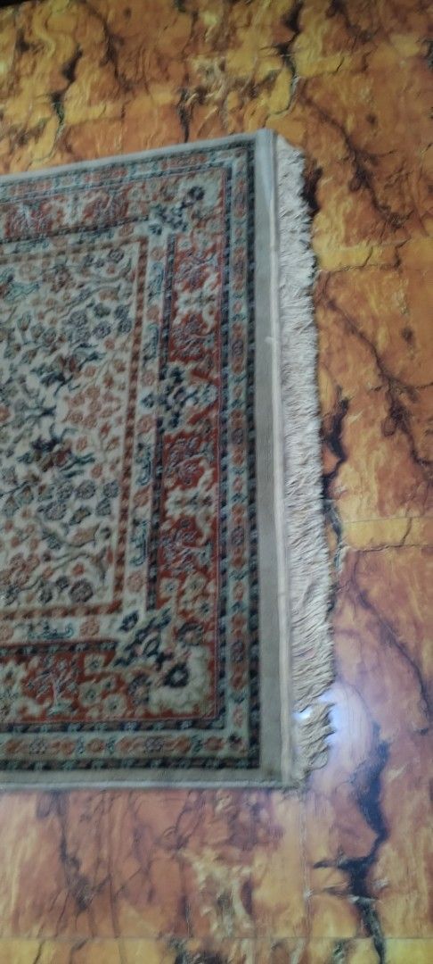Persian Style Area Rug with Tassels (Category: Carpets, Mats & Flooring) located in Caloocan City. Submitted by rowely_jpn (Listing ID 1458873961, Image 2). Description: Japan surplus Vintage carpet Beautiful area rug with intricate floral patterns. Features a classic Persian design with a central medallion and decorative border. The edges have fringe tassels. Adds warmth and style to any room. Measures approximately [insert dimensions here if kn