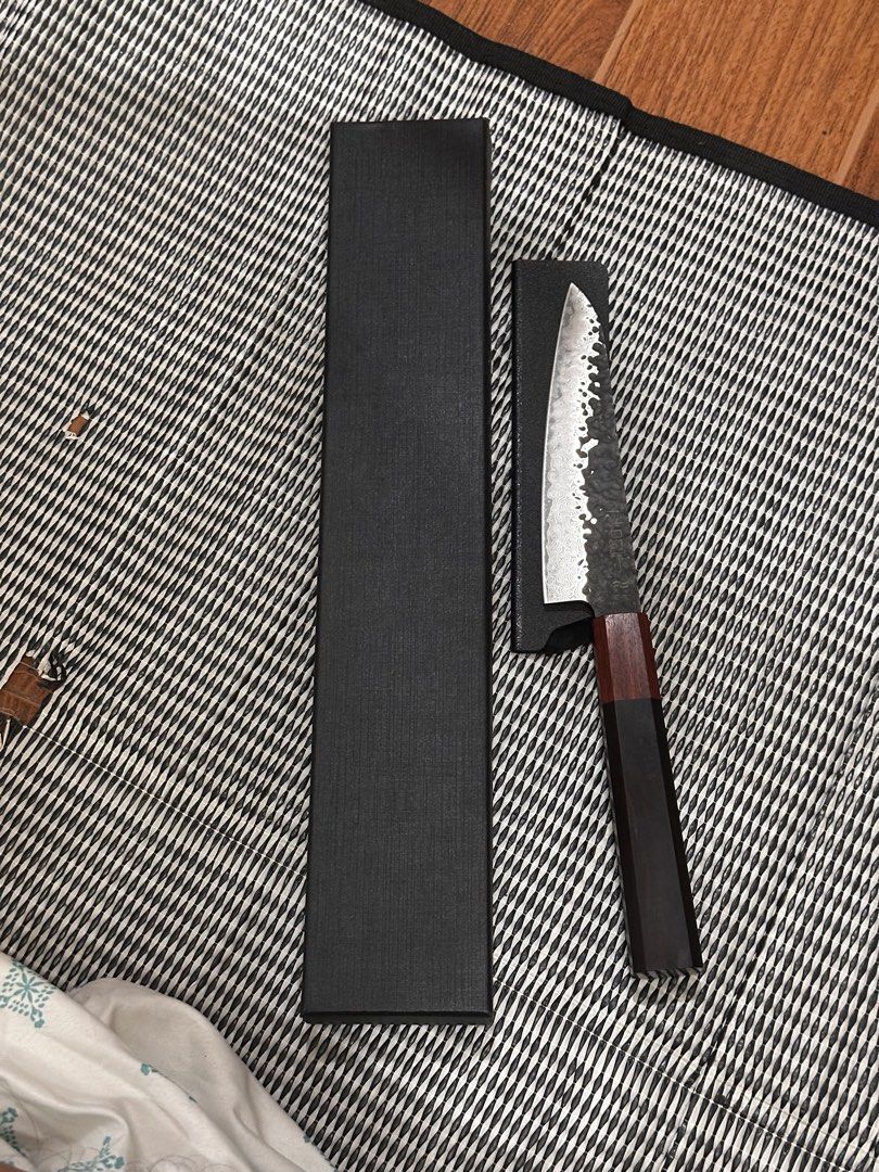 Petty knife (Category: Knives & Chopping Boards) located in Manila. Submitted by qweqwe1530 (Listing ID 1458732786, Image 1). Description: - Authentic Japanese style chef knife - hammered finish - Comes with a protective box and knife guard for safe storage - rfs: declutter .