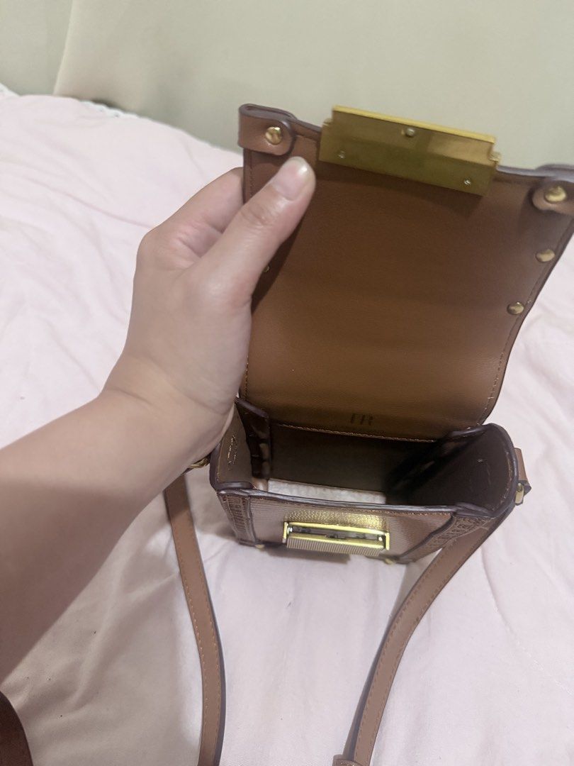 Phone Sling bag - Cutesy (Category: Purses & Pouches) located in Paranaque City. Submitted by debonair02 (Listing ID 1458700404, Image 3). Description: Phone Sling Bag Leather Can fit your I-phone-Pro Max Bought in Korea In good condition PM SURE BUYER ONLY! .