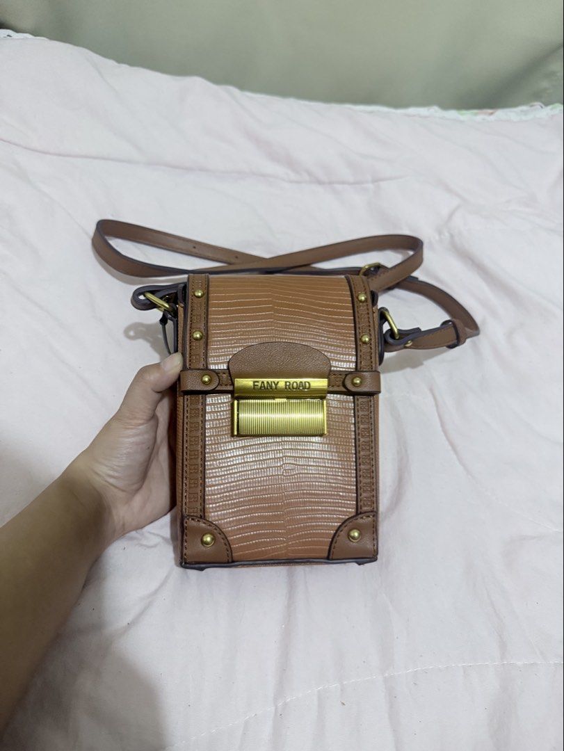 Phone Sling bag - Cutesy (Category: Purses & Pouches) located in Paranaque City. Submitted by debonair02 (Listing ID 1458700404, Image 1). Description: Phone Sling Bag Leather Can fit your I-phone-Pro Max Bought in Korea In good condition PM SURE BUYER ONLY! .