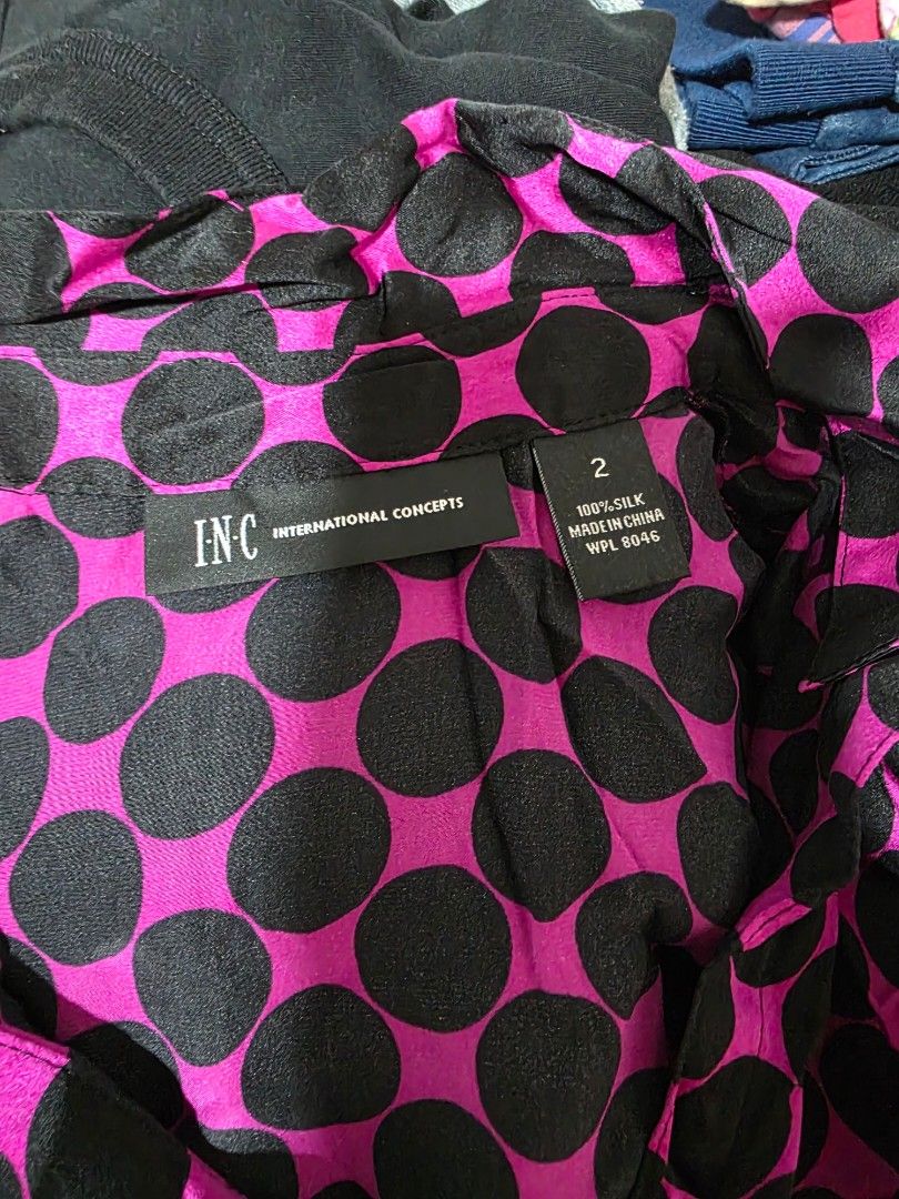 Pink and Black Polka Dot Blouse (Category: Blouses) located in Quezon City. Submitted by highonspotlight (Listing ID 1458721697, Image 2). Description: - Adorable short-sleeved blouse - Eye-catching pink and black polka dot pattern - Classic collared neckline - Flattering cinched waist design - Fabric with a subtle sheen - Versatile: dress up or down, pair with skirts or pants.