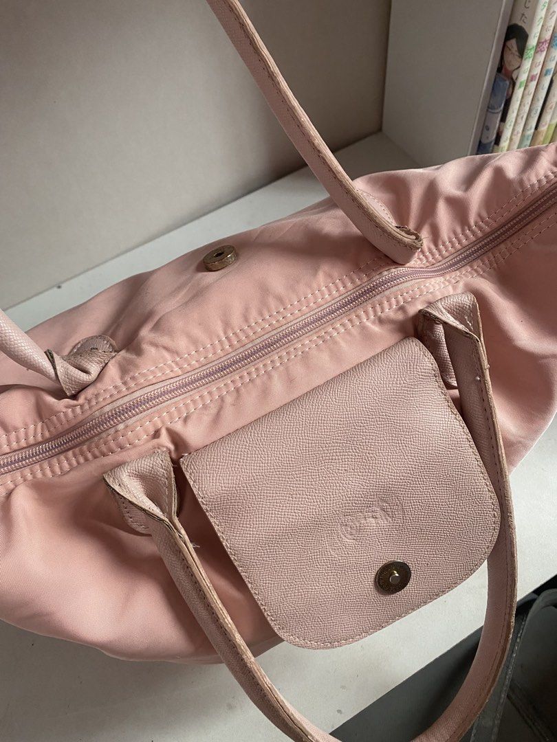 PINK LONGCHAMP INSPIRED BAG (Category: Shoulder Bags) located in Muntinlupa City. Submitted by arimisu (Listing ID 1458764054, Image 3). Description: Hello selling this longchamp inspired bag! got it before on my training on shanghai china! only used few times and still on good condition! let me know if you’re interested so i can send more photos of the item Pink color • Spacious interior • Easy to carry • Great for school, office, or casual use 