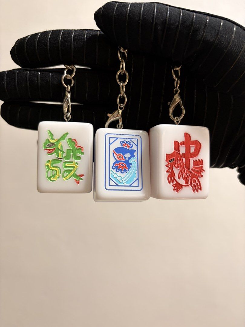 Pokémon: Mahjong Tiles Keychain (Category: Character Goods) located in Caloocan City. Submitted by neverletmigo (Listing ID 1458709943, Image 1). Description: - Brand New and Unused - Sold as set only - Ideal for any Pokemon enthusiast. - Featured Pokémon: Rayquaza (Green Dragon Tile), Kyogre (White Dragon Tile), Groudon (Red Dragon Tile) - Layaway / Installment Terms Available .