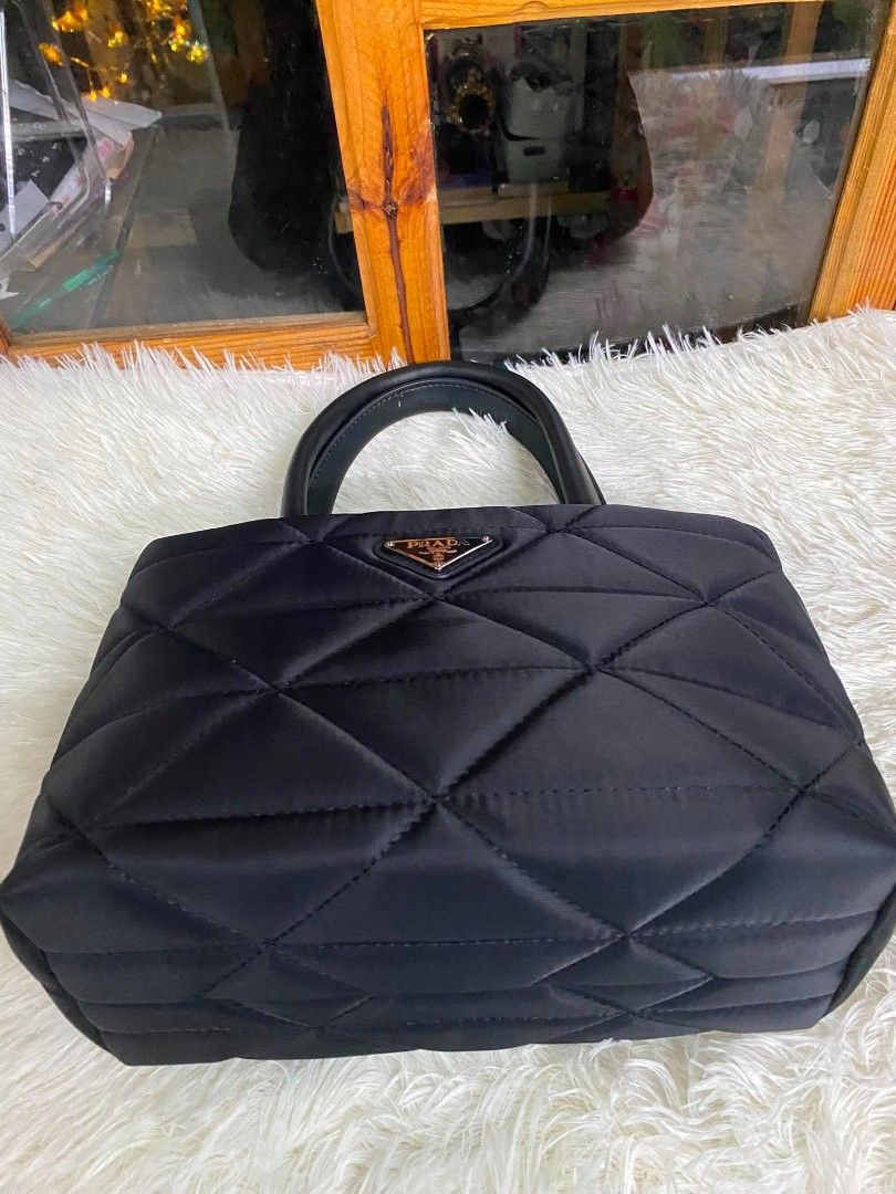 Prada 2way bag (Category: Luxury Bags & Wallets) located in Baguio. Submitted by luxuryitembags (Listing ID 1458714438, Image 3). Description: 2nd hand (orig) no issues, in a good condition dustbag inclusion only nego price.