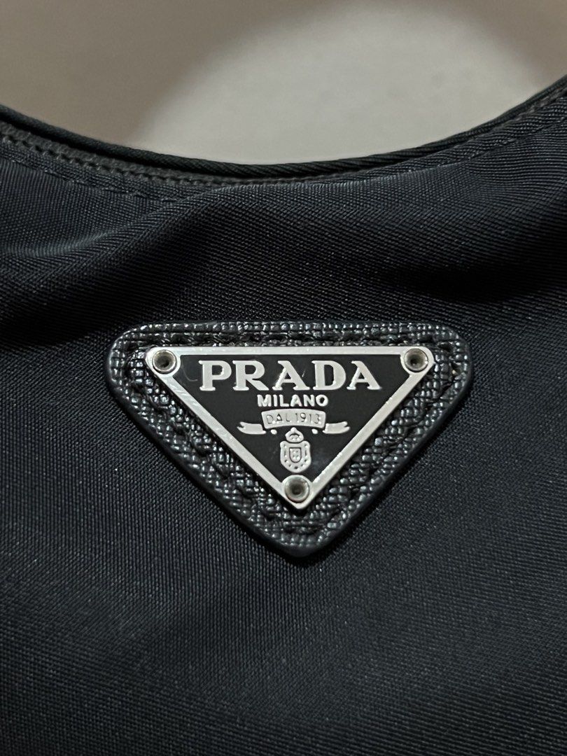 Prada Re-Edition 2000 Nylon Shoulder Bag Black (Category: Luxury Bags & Wallets) located in Valenzuela. Submitted by cc_c__cc (Listing ID 1458856881, Image 2). Description: As is No inclusions Signs of use Rfs. Decluttering unused bags Need funds.