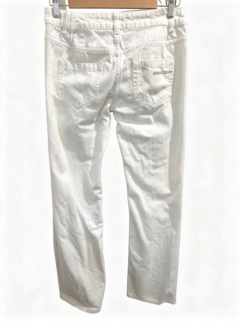 Prada White Denim Jeans (Category: Jeans) located in Pasay City. Submitted by adoseofluxxee (Listing ID 1458779479, Image 2). Description: - Authentic Prada Jeans - Classic Five-Pocket Style - Button and Zip Closure - Subtle Prada Branding on Back Pocket & Button - Straight Leg Fit.