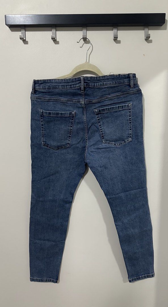 Pull & Bear Carrot Fit Blue Denim Jeans (Category: Jeans) located in Mandaluyong City. Submitted by p_dcltrs (Listing ID 1458779764, Image 3). Description: - Brand: Pull & Bear - Fit: Carrot Fit - Wash: Classic Blue Denim - Size: EUR 44 / USA 34 / MEX 34 - Origin: Made in Bangladesh - Occasion: Ideal for casual wear - Condition: Please check photos for detailed condition..
