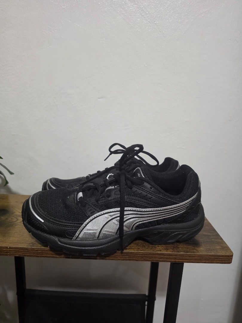 Puma Shoes Black Silver (Category: Sneakers) located in Muntinlupa City. Submitted by baebunbun (Listing ID 1458763848, Image 1). Description: Black Puma running shoes with silver accents. Lace-up closure. Size 7 US Women's. bought online puma, no box, used once for a dance cover.