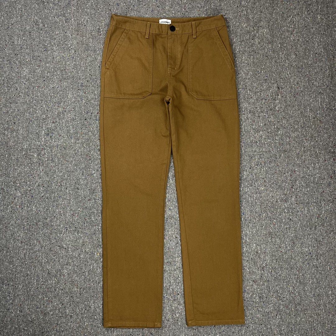 QT8 Garments Type 1 brown fatigue baker pants (Category: Trousers) located in Zamboanga. Submitted by deconstrukt.fit (Listing ID 1458875035, Image 1). Description: QT8 Garments Type 1 brown fatigue baker pants brown Fatigue Pants from the South Korean streetwear brand QT8 Garments feature a distinct military-inspired design with flat, square front patch pockets and a straight-leg silhouette. Size Medium 32 Waist (tagged) Dimension: 16” Waist 43”